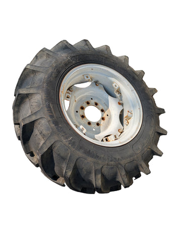 USED FORD NEW HOLLAND 2120 REAR RIM WITH 14.9X24 CONTINENTAL TIRE