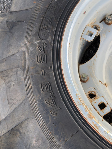 USED FORD NEW HOLLAND 2120 REAR RIM WITH 14.9X24 CONTINENTAL TIRE