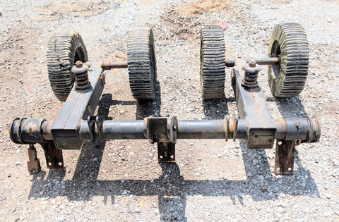 USED  2615L HOG 50018536 CENTER AXLE ASSEMBLY WITH TIRES-COMES AS PICTURED