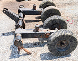 USED  2615L HOG 50018536 CENTER AXLE ASSEMBLY WITH TIRES-COMES AS PICTURED