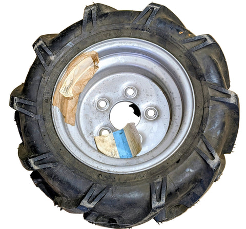 TIRE REF. TU98011524 - MASSEY FERGUSON NEW OLD STOCK 19.5X8.25X10 TIRE 6X10 WHEEL