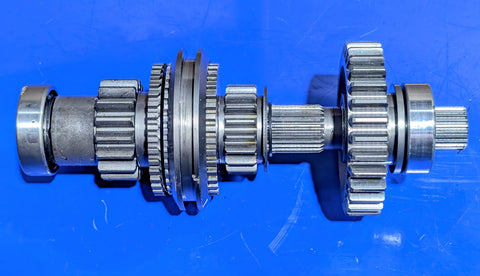 USED L2501 KUBOTA Part # TC220-21912 SHAFT, RANGE GEAR WITH GEARS